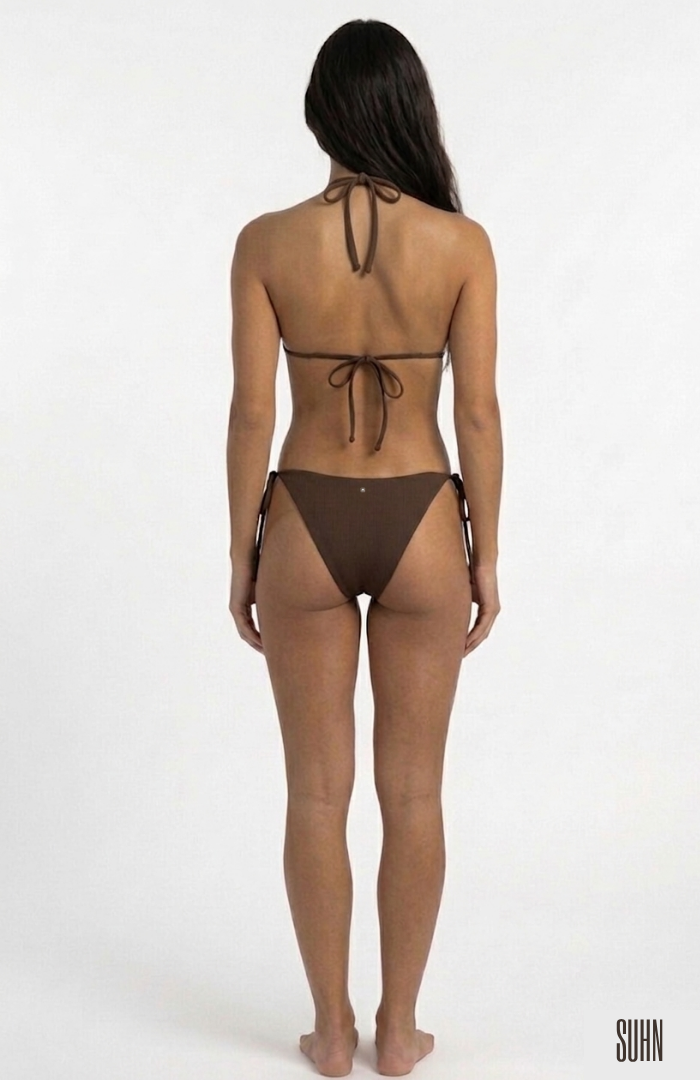 Model in brown bikini bottoms