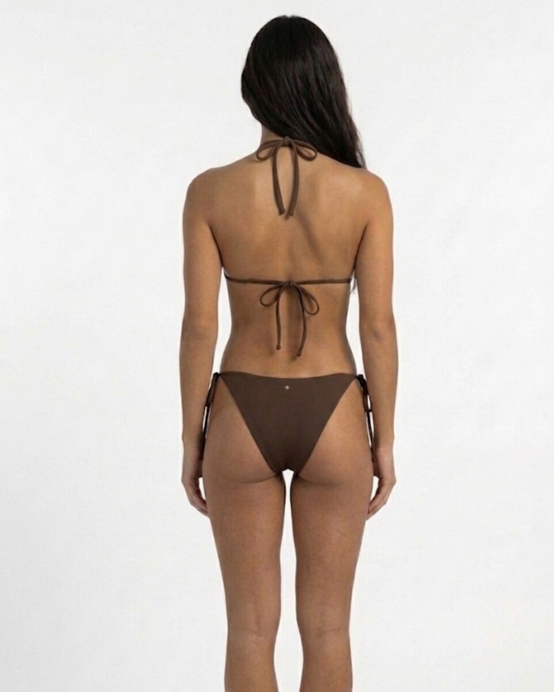 brunette model wearing the SUHN Swim maui brown relax triangle bikini. back view